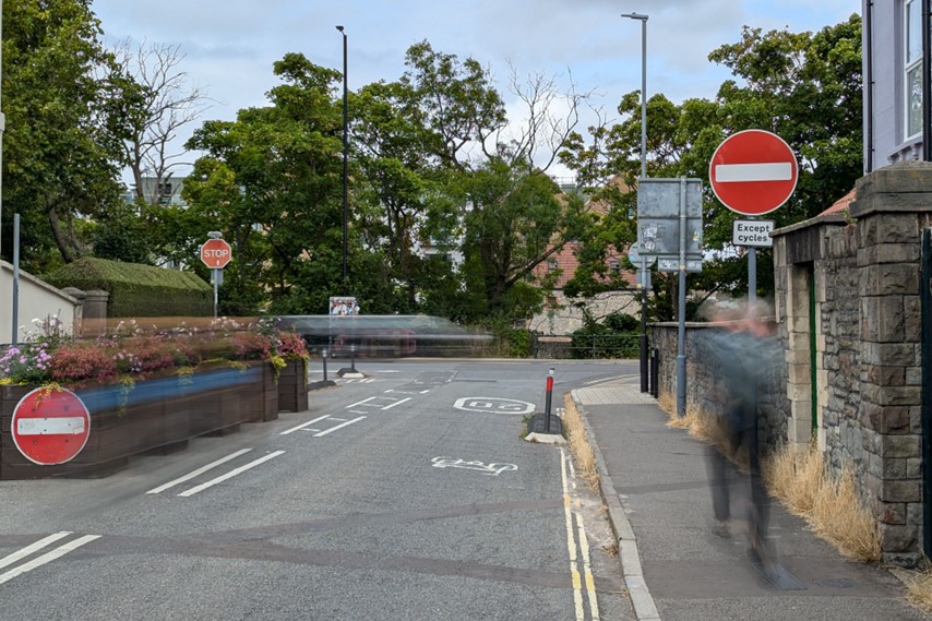 View o Dean Lane showing the temporary planters restricting vehicle access onto Coronation Road