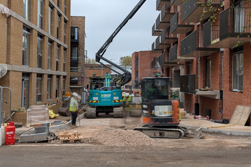 Construction workers building Leicester Street